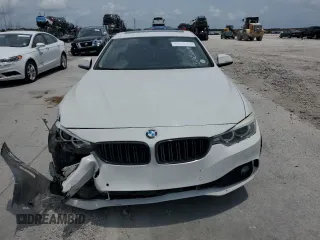 2015 BMW 4 Series 428i с VIN WBA4A5C55FGK16037, выставлен на аукционе Copart как лот 57650695 с пробегом Не указан миль и Списание • Salvage title. История ставок и продаж доступна на DreamBid. Изображение 5.