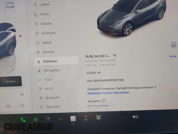 2023 Tesla Model Y Long Range with VIN 7SAYGAEE8PF667728, listed as a IAAI auction lot 41839771 with 32,654 mi miles and . Bid and sale history available at DreamBid. Image 15.