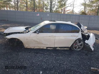 2013 BMW 3 Series 335i xDrive with VIN WBA3B9G56DNR90087, listed as a IAAI auction lot 41674929 with 26,001 mi miles and . Bid and sale history available at DreamBid. Image 14.
