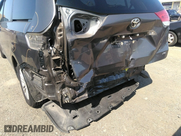 2014 Toyota Sienna XLE with VIN 5TDYK3DC2ES418860, listed as a IAAI auction lot 40139260 with 67,599 mi miles and . Bid and sale history available at DreamBid. Image 6.
