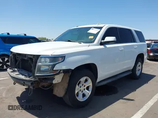 2015 Chevrolet Tahoe Commercial with VIN 1GNSK3EC9FR622941, listed as a IAAI auction lot 42592315 with 239,334 mi miles and . Bid and sale history available at DreamBid. Image 2.