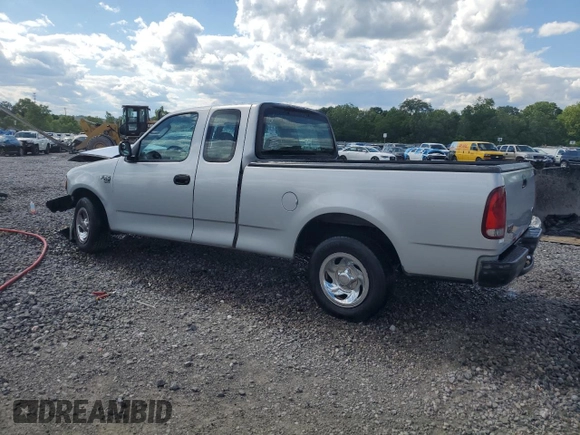 2004 Ford F-150 XL with VIN 2FTRX17W24CA52991, listed as a Copart auction lot 55853095 with 221,452 mi miles and Salvage title. Bid and sale history available at DreamBid. Image 2.