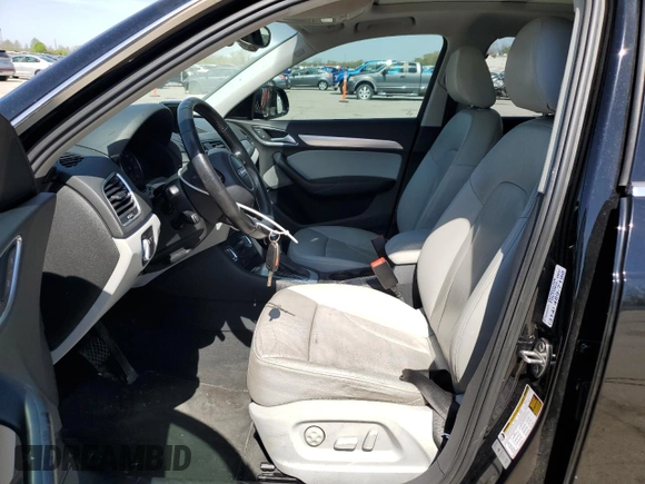 2015 Audi Q3 Premium Plus with VIN WA1BFCFS1FR004865, listed as a Copart auction lot 53348405 with 130,521 mi miles and Salvage title. Bid and sale history available at DreamBid. Image 7.