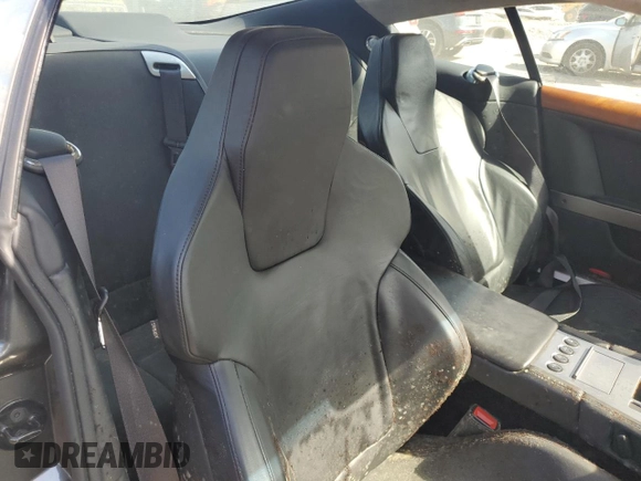 2005 Aston Martin DB9 z VIN SCFAD01A75GA02198, wystawiony jako Copart lot #75564554 z przebiegiem Nie podano mil oraz Nie do naprawy • Non repairable. Historia ofert i sprzedaży dostępna na DreamBid. Obrazek 10.