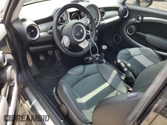 2007 MINI Hardtop S with VIN WMWMF73577TT84087, listed as a Copart auction lot 60208895 with 76,248 mi miles and Salvage title. Bid and sale history available at DreamBid. Image 8.