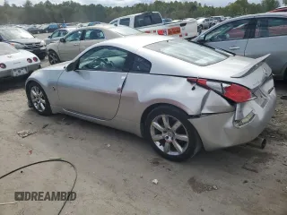 2003 Nissan 350Z with VIN JN1AZ34D73T103916, listed as a Copart auction lot 73709474 with 126,353 mi miles and Salvage Title. Bid and sale history available at carsss.com. Image 2.