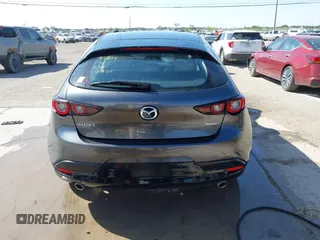 2023 Mazda 3 S Preferred with VIN JM1BPALM6P1610353, listed as a IAAI auction lot 42144106 with 55,131 mi miles and . Bid and sale history available at DreamBid. Image 16.