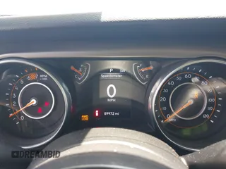 2018 Jeep Wrangler Unlimited Sport S with VIN 1C4HJXDN7JW232530, listed as a IAAI auction lot 42362544 with 89,972 mi miles and . Bid and sale history available at DreamBid. Image 7.
