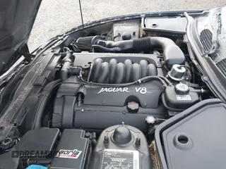 1997 Jaguar XK with VIN SAJGX5741VC004596, listed as a IAAI auction lot 41588751 with 188,607 mi miles and . Bid and sale history available at DreamBid. Image 10.
