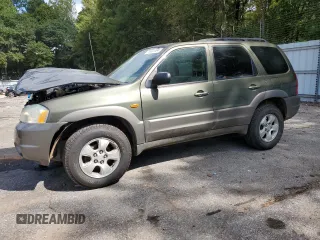 2002 Mazda Tribute LX with VIN 4F2YU09122KM55085, listed as a Copart auction lot 71604184 with 185,158 mi miles and Salvage Title. Bid and sale history available at carsss.com. Image 1.
