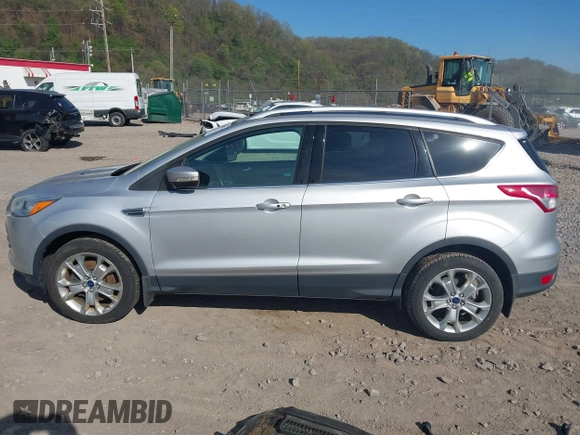 2016 Ford Escape Titanium with VIN 1FMCU9JX2GUA50916, listed as a IAAI auction lot 42118711 with 121,405 mi miles. Bid and sale history available at carsss.com. Image 15.