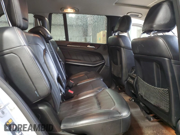 2013 Mercedes-Benz GL 450 z VIN 4JGDF7CE5DA249552, wystawiony jako Copart lot #52590995 z przebiegiem 128 518 mil mil oraz Szkoda całkowita • Salvage title. Historia ofert i sprzedaży dostępna na DreamBid. Obrazek 11.