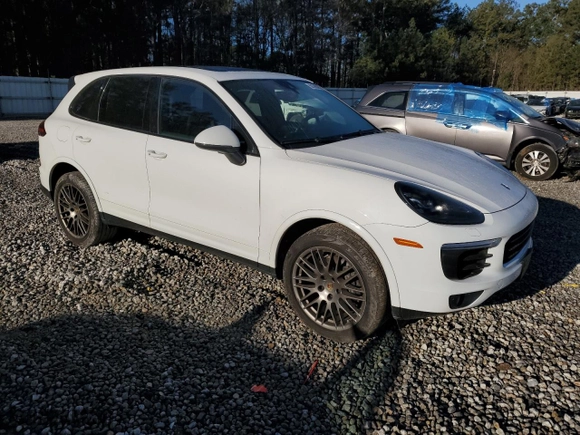 2017 Porsche Cayenne with VIN WP1AA2A23HKA91129, listed as a Copart auction lot 50390065 with 90,435 mi miles and Salvage Title. Bid and sale history available at carsss.com. Image 4.