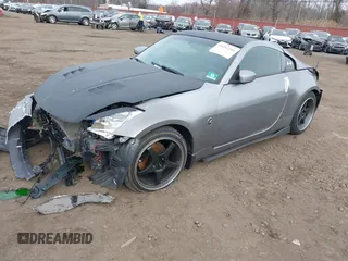 2003 Nissan 350Z Touring z VIN JN1AZ34E33T003711, wystawiony jako IAAI lot #41351191 z przebiegiem 167 503 mil mil oraz . Historia ofert i sprzedaży dostępna na DreamBid. Obrazek 17.