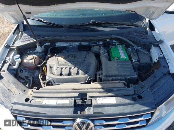 2018 Volkswagen Tiguan S with VIN 3VV0B7AX8JM076693, listed as a IAAI auction lot 42044886 with 109,660 mi miles and . Bid and sale history available at DreamBid. Image 10.
