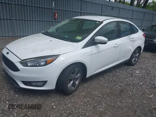 2017 Ford Focus SE with VIN 1FADP3FEXHL233966, listed as a IAAI auction lot 42220832 with 70,197 mi miles and . Bid and sale history available at carsss.com. Image 2.