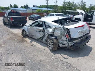 2014 Cadillac CTS Performance with VIN 1G6DG1E35E0107139, listed as a IAAI auction lot 42371034 with 56,988 mi miles and . Bid and sale history available at DreamBid. Image 3.