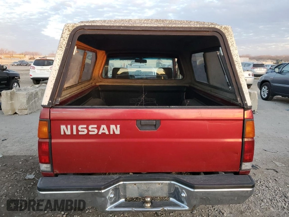1993 Nissan Frontier z VIN 1N6SD11S0PC332903, wystawiony jako Copart lot #84039484 z przebiegiem 136 324 mil mil oraz Szkoda całkowita • Salvage title. Historia ofert i sprzedaży dostępna na DreamBid. Obrazek 6.