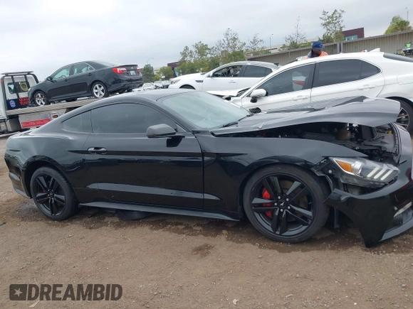 2015 Ford Mustang EcoBoost z VIN 1FA6P8TH6F5370313, wystawiony jako IAAI lot #42206594 z przebiegiem 76 769 mil mil oraz . Historia ofert i sprzedaży dostępna na DreamBid. Obrazek 13.