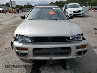 1999 Subaru Impreza L with VIN JF1GF4351XH815210, listed as a Copart auction lot 71250504 with 141,806 mi miles and Salvage title. Bid and sale history available at DreamBid. Image 5.