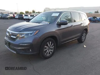 2021 Honda Pilot EX-L with VIN 5FNYF5H54MB018846, listed as a IAAI auction lot 41208987 with 80,757 mi miles and . Bid and sale history available at DreamBid. Image 2.