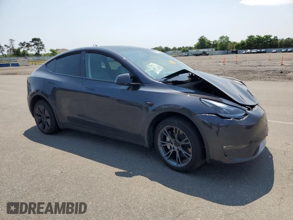 2024 Tesla Model Y Long Range с VIN 7SAYGDEE7RF180945, выставлен на аукционе Copart как лот 62059735 с пробегом Не указан миль и Списание • Salvage title. История ставок и продаж доступна на DreamBid. Изображение 4.