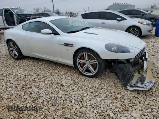 2009 Aston Martin DB9 z VIN SCFAD01E59GA10938, wystawiony jako Copart lot #39463124 z przebiegiem 19 856 mil mil oraz . Historia ofert i sprzedaży dostępna na DreamBid. Obrazek 4.