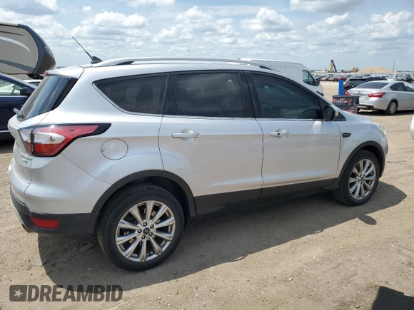 2018 Ford Escape Titanium with VIN 1FMCU9J99JUC89677, listed as a Copart auction lot 60421545 with 98,021 mi miles and Salvage title. Bid and sale history available at DreamBid. Image 3.