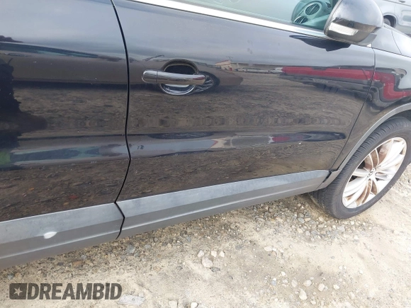 2011 Volkswagen Tiguan SEL with VIN WVGBV7AX6BW521525, listed as a IAAI auction lot 42490216 with 123,546 mi miles and . Bid and sale history available at DreamBid. Image 6.