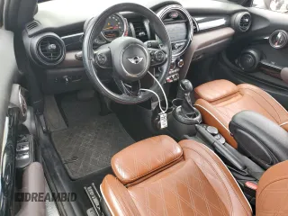 2017 MINI Convertible Cooper S с VIN WMWWG9C5XH3C80635, выставлен на аукционе Copart как лот 56167715 с пробегом 79 485 миль миль и Списание • Salvage title. История ставок и продаж доступна на DreamBid. Изображение 8.