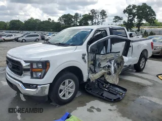 2023 Ford F-150 XL with VIN 1FTEW1CP2PKD34869, listed as a Copart auction lot 54404605 with 27,074 mi miles and Salvage title. Bid and sale history available at DreamBid. Image 1.