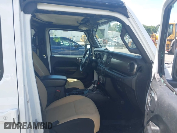2018 Jeep Wrangler Unlimited Sport с VIN 1C4HJXDG3JW129798, выставлен на аукционе IAAI как лот 42635872 с пробегом 74 392 миль миль и . История ставок и продаж доступна на DreamBid. Изображение 5.