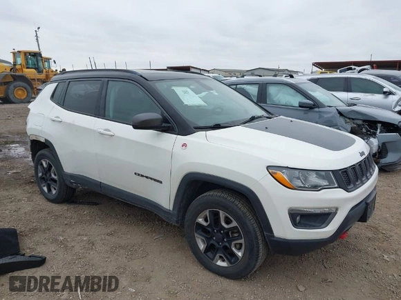 2018 Jeep Compass Trailhawk with VIN 3C4NJDDB7JT144431, listed as a IAAI auction lot 41629703 with 122,079 mi miles and . Bid and sale history available at carsss.com. Image 1.
