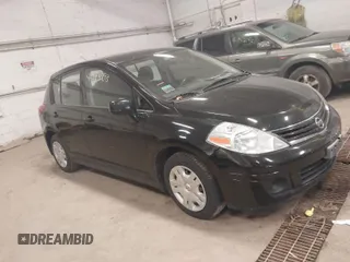 2012 Nissan Versa S with VIN 3N1BC1CP9CK248665, listed as a IAAI auction lot 41974293 with 146,465 mi miles. Bid and sale history available at carsss.com. Image 1.