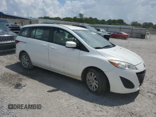 2014 Mazda 5 Sport with VIN JM1CW2BL7E0173729, listed as a Copart auction lot 68676554 with 102,734 mi miles and Salvage Title. Bid and sale history available at DreamBid. Image 4.
