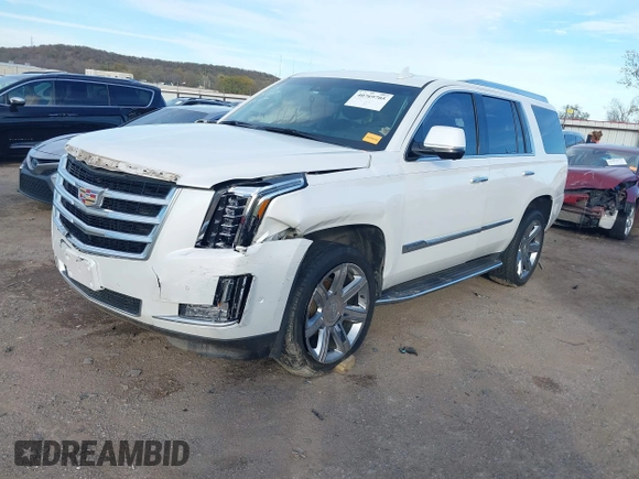 2018 Cadillac Escalade Luxury z VIN 1GYS3BKJ7JR140183, wystawiony jako IAAI lot #40769705 z przebiegiem 106 774 mil mil oraz . Historia ofert i sprzedaży dostępna na DreamBid. Obrazek 2.