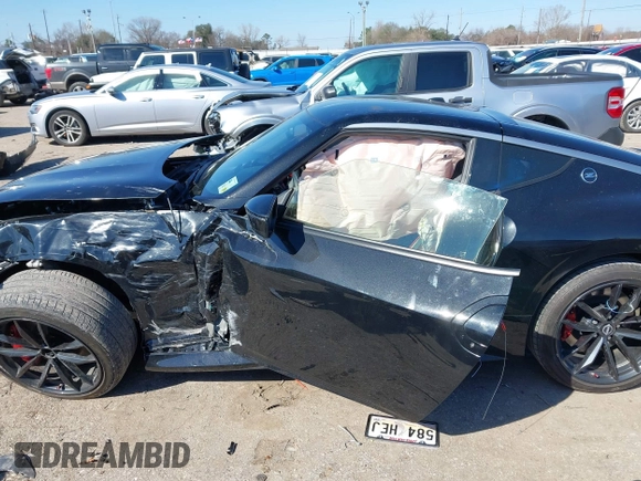 2023 Nissan Z Performance with VIN JN1BZ4BH9PM310761, listed as a IAAI auction lot 41630494 with 6,541 mi miles and . Bid and sale history available at DreamBid. Image 14.