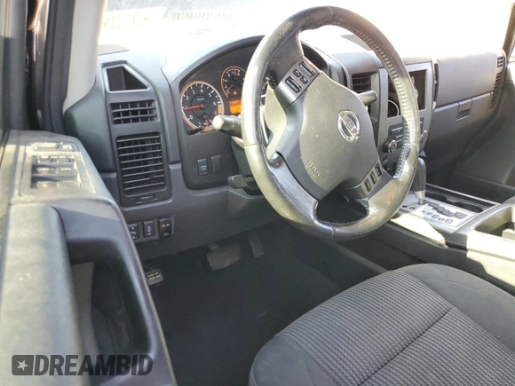 2012 Nissan Titan SV with VIN 1N6BA0EC0CN316317, listed as a Copart auction lot 57576905 with 113,323 mi miles and Salvage title. Bid and sale history available at DreamBid. Image 8.