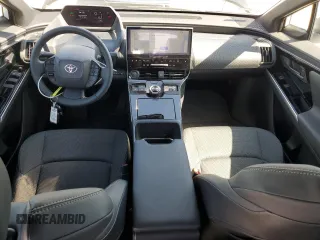 2024 Toyota bZ4X XLE with VIN JTMABACA8RA073861, listed as a Copart auction lot 50030475 with 6,465 mi miles and Salvage Title. Bid and sale history available at DreamBid. Image 8.