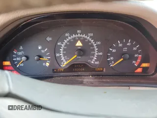 1999 Mercedes-Benz E-Class with VIN WDBJF65HXXA914389, listed as a Copart auction lot 72935884 with 192,084 mi miles and Salvage Title. Bid and sale history available at carsss.com. Image 9.