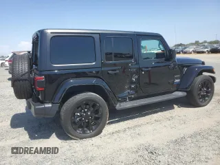 2023 Jeep Wrangler Sahara with VIN 1C4JJXP61PW512975, listed as a Copart auction lot 59392075 with 26,954 mi miles and Salvage title. Bid and sale history available at DreamBid. Image 3.