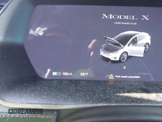2021 Tesla Model X Long Range Plus with VIN 5YJXCDE29MF316169, listed as a IAAI auction lot 41232066 with 53,235 mi miles and . Bid and sale history available at carsss.com. Image 18.