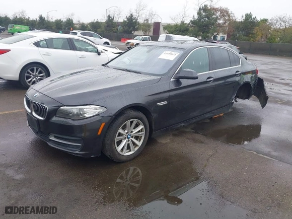2014 BMW 5 Series 528i with VIN WBA5A5C5XED512448, listed as a IAAI auction lot 41559871 with 145,383 mi miles. Bid and sale history available at carsss.com. Image 2.