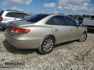 2009 Hyundai Azera GLS with VIN KMHFC46D99A352421, listed as a Copart auction lot 56796815 with 56,104 mi miles and Clean title. Bid and sale history available at DreamBid. Image 3.