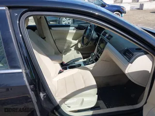 2013 Volkswagen Passat SE with VIN 1VWBP7A35DC102546, listed as a IAAI auction lot 41822612 with 127,334 mi miles. Bid and sale history available at carsss.com. Image 5.