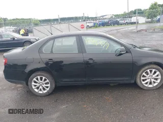 2010 Volkswagen Jetta Limited Edition z VIN 3VWAZ7AJ3AM096583, wystawiony jako IAAI lot #42487699 z przebiegiem 194 527 mil mil oraz . Historia ofert i sprzedaży dostępna na DreamBid. Obrazek 13.