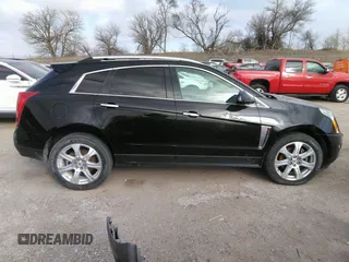 2016 Cadillac SRX Performance Collection z VIN 3GYFNCE32GS505552, wystawiony jako IAAI lot #40949642 z przebiegiem 143 343 mil mil oraz . Historia ofert i sprzedaży dostępna na DreamBid. Obrazek 13.