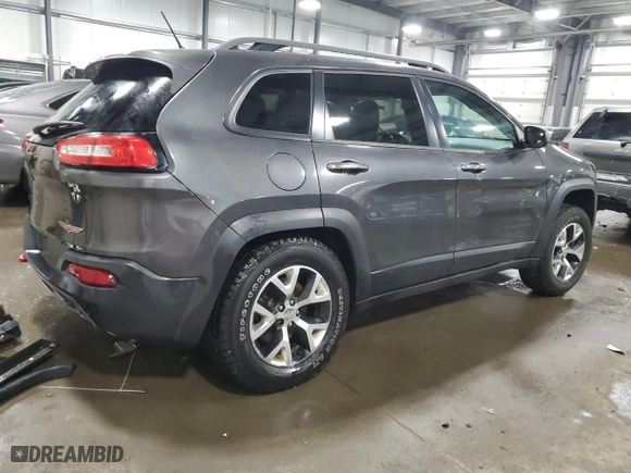 2015 Jeep Cherokee Trailhawk with VIN 1C4PJMBS6FW786085, listed as a Copart auction lot 48791955 with 123,574 mi miles and Salvage Title. Bid and sale history available at carsss.com. Image 3.