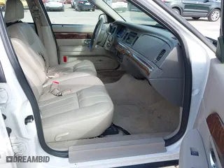 2010 Mercury Grand Marquis LS with VIN 2MEBM7FV7AX611959, listed as a IAAI auction lot 41980176 with 112,885 mi miles. Bid and sale history available at carsss.com. Image 5.