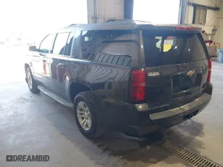2015 Chevrolet Suburban LT with VIN 1GNSKJKC5FR264018, listed as a IAAI auction lot 42056645 with 194,479 mi miles. Bid and sale history available at carsss.com. Image 3.